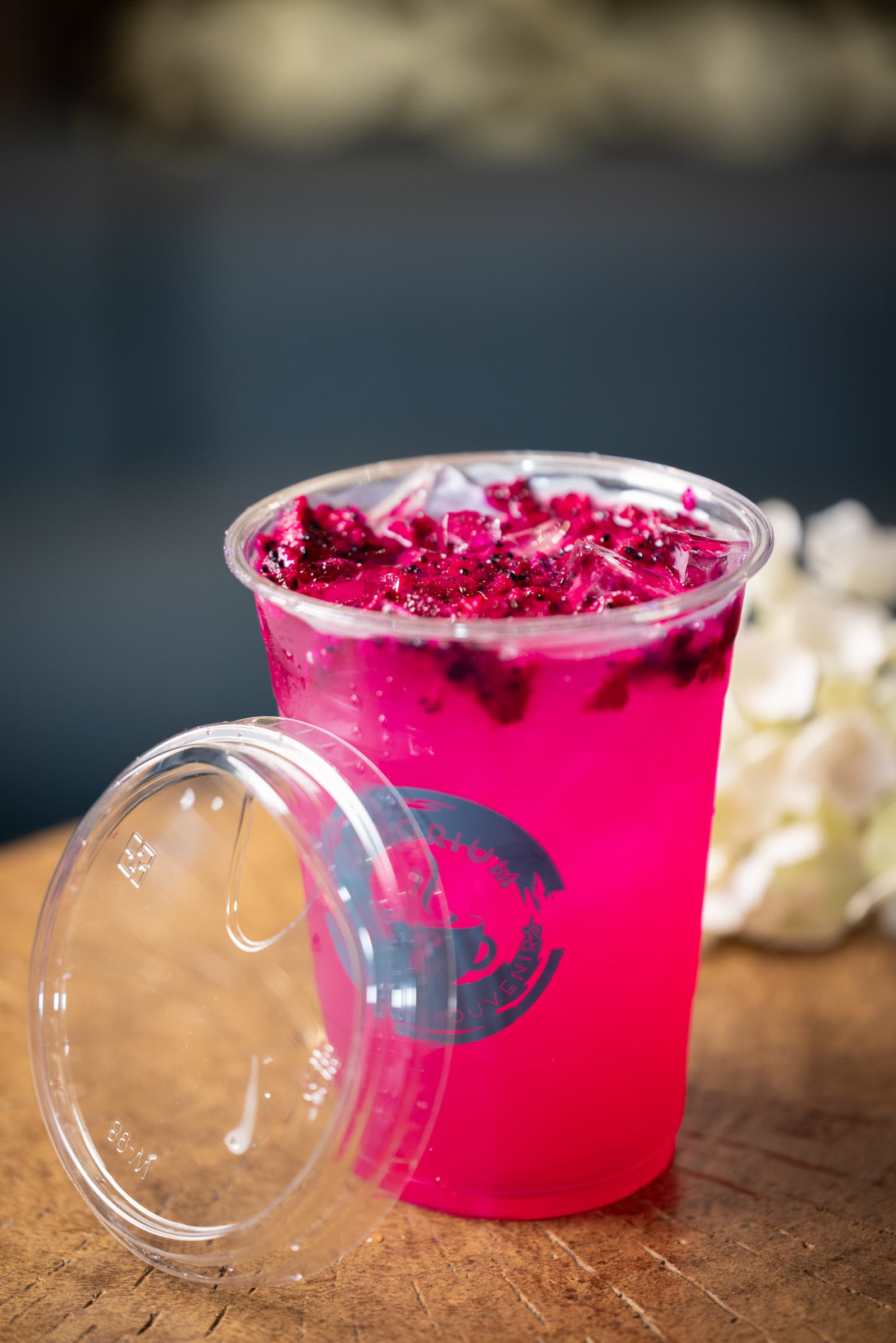 Iced dragonfruit refresher in a branded Emporium cup